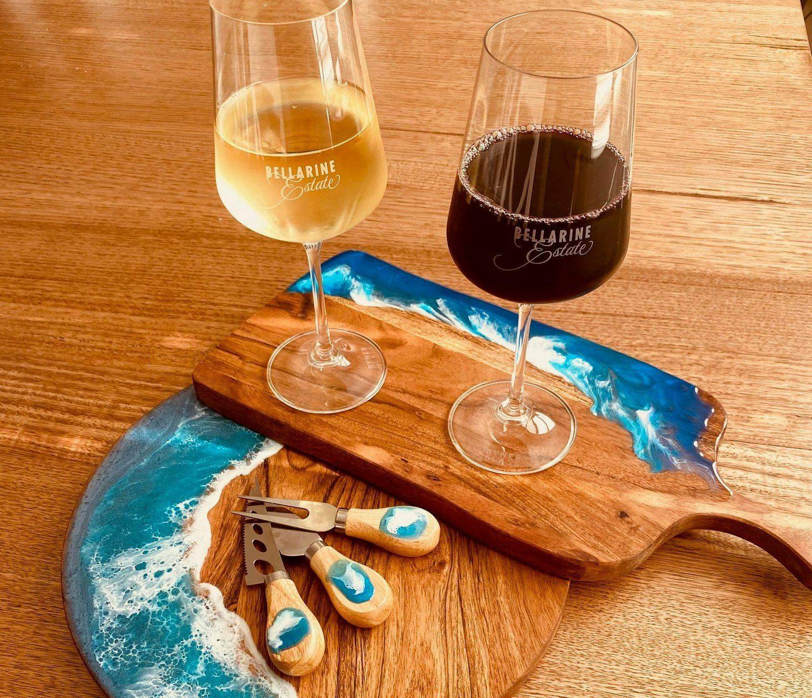 Resin decorated cheeseboard and knives with wine glasses at Bellarine Estate