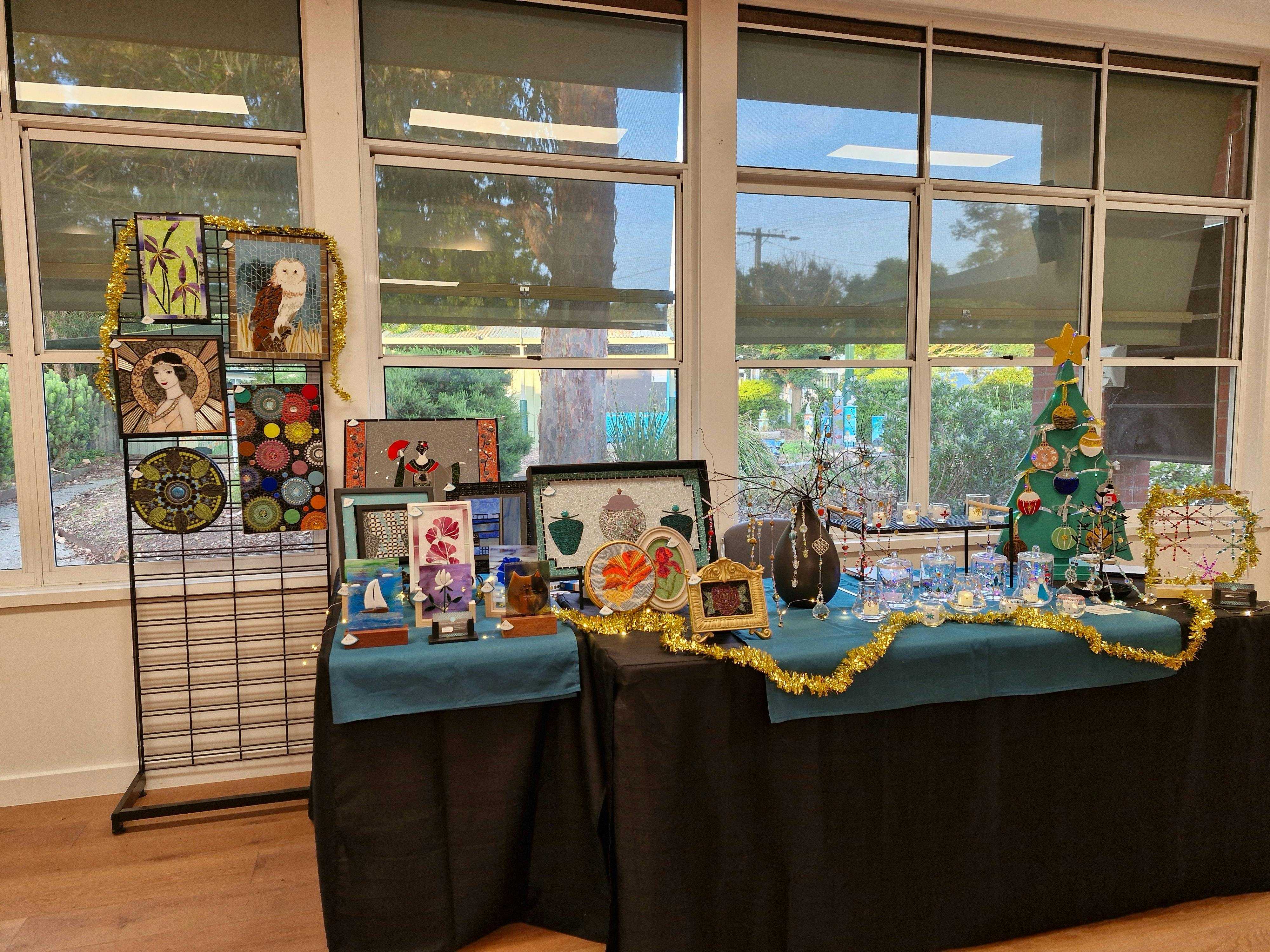 Handmade mosaics, glassware and gifts displayed at the Festival of Glass Christmas Market.