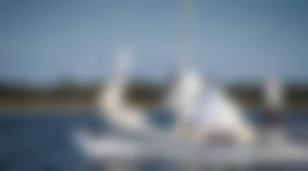 Three people on a yacht in Paynesville