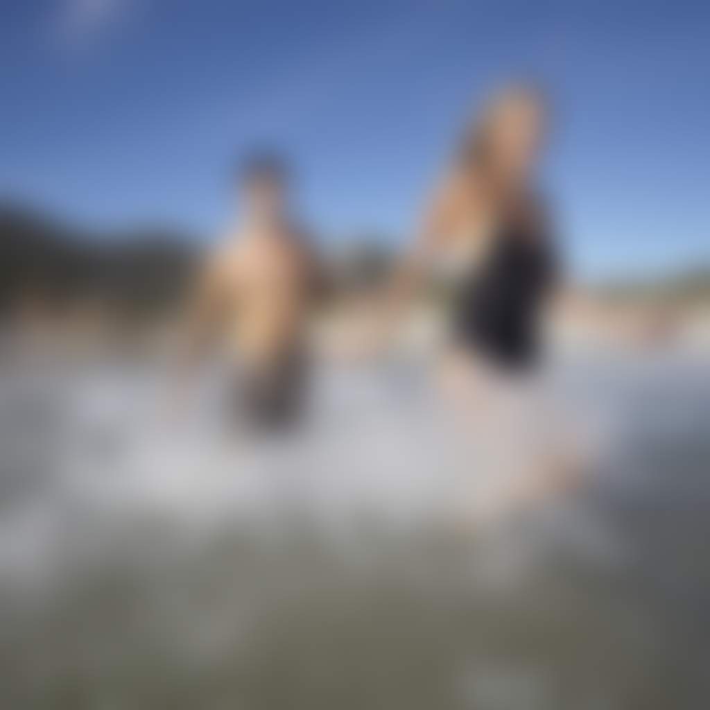 Squeaky Beach Wilsons Prom couple splashing through the water