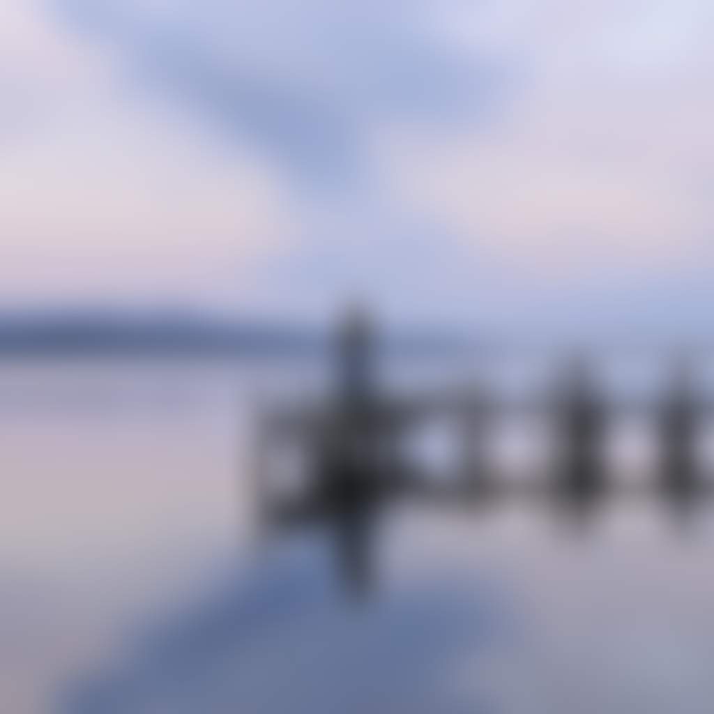 Mallacoota man fishing from the jetty at sunset