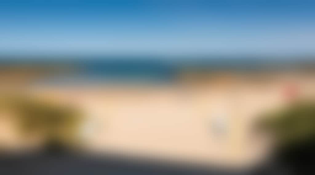 Cape Paterson foreshore beach with surf life saving flags