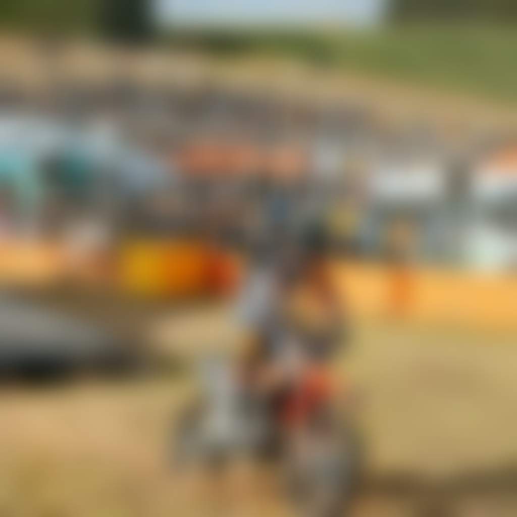 Farm World 2024 motocross rider on track with crowd watching at Lardner Park event