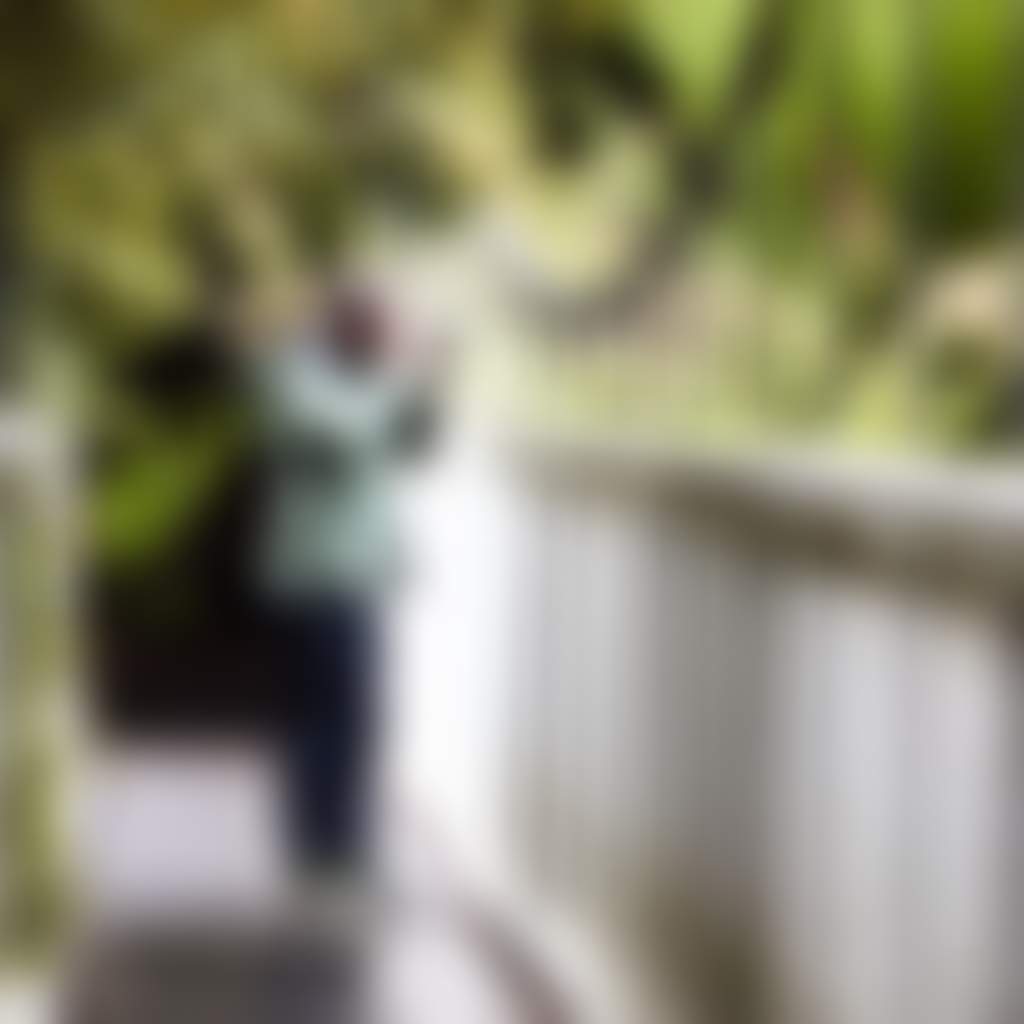 Man taking photo from Corrigans Bridge Tarra Bulga National Park