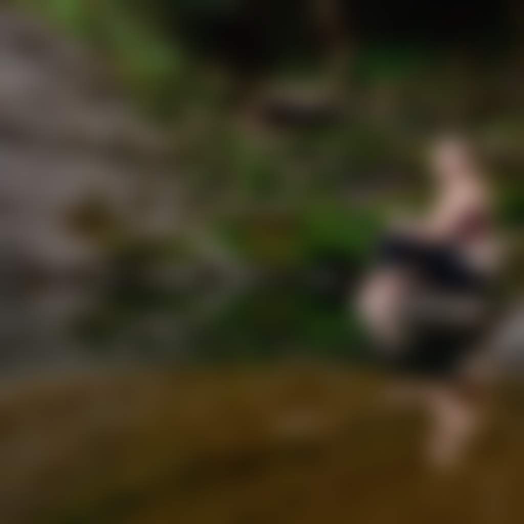 Basin Creek Falls girl sitting at base of waterfall in Snowy River National Park
