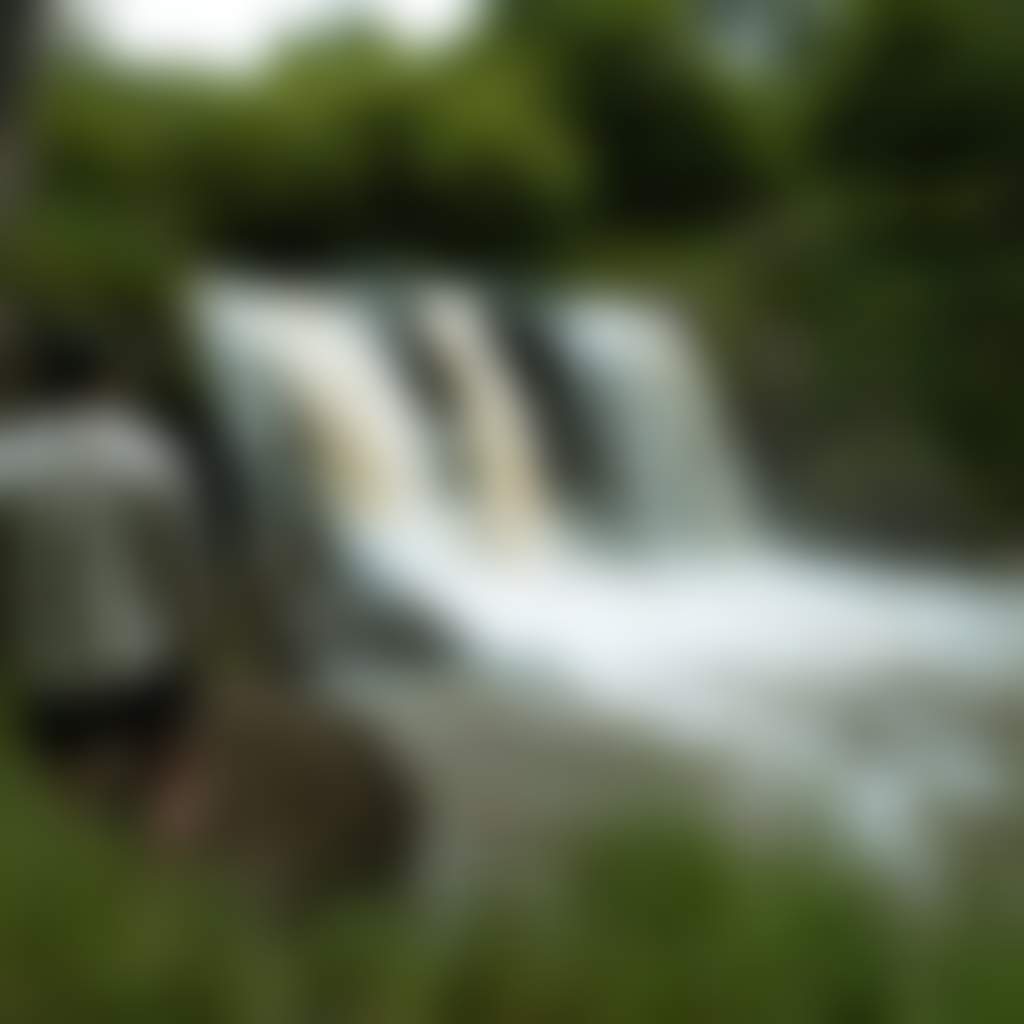 Narracan Falls man standing in front of waterfall at picnic area