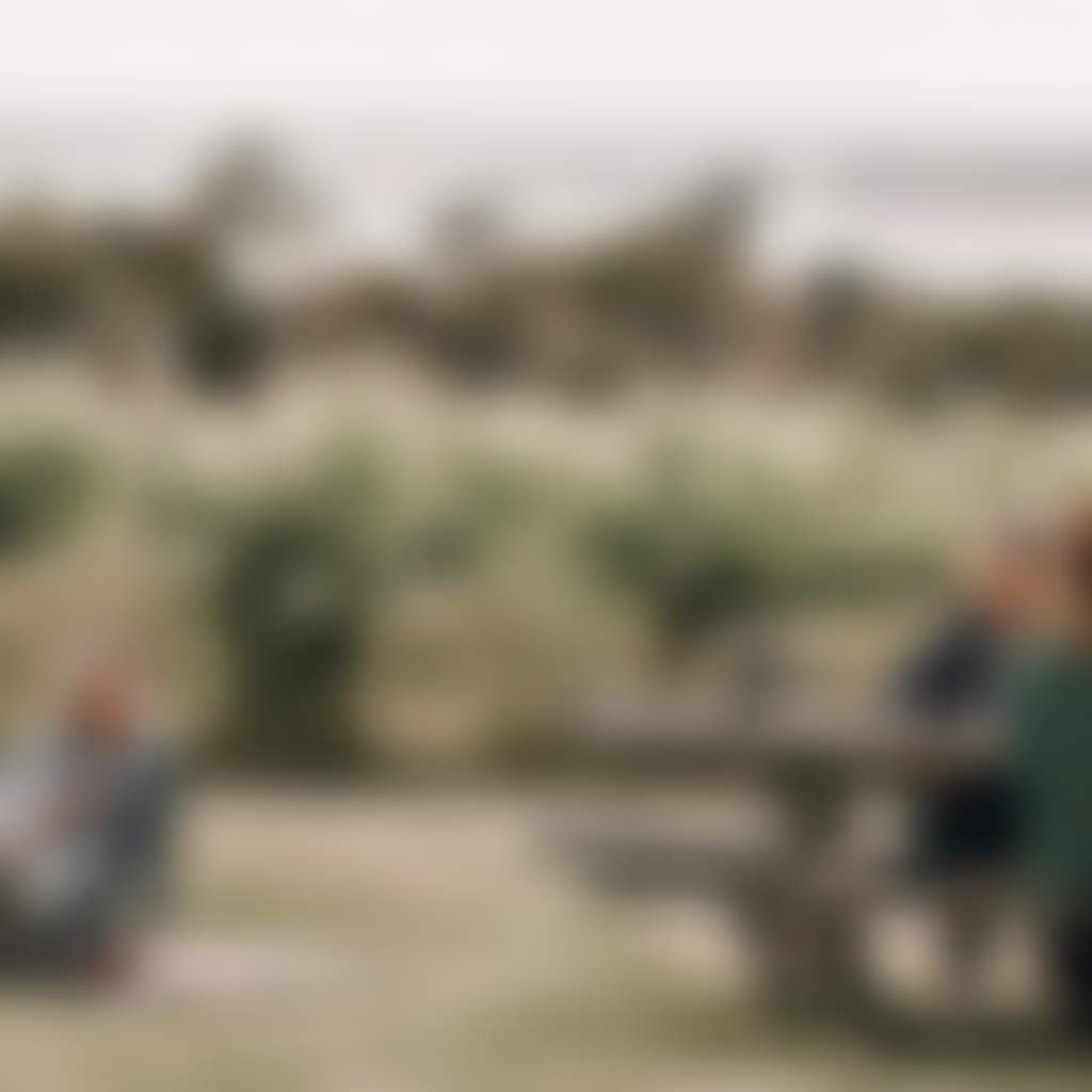 The Gurdies Winery The Gurdies friends sitting outside enjoying wine