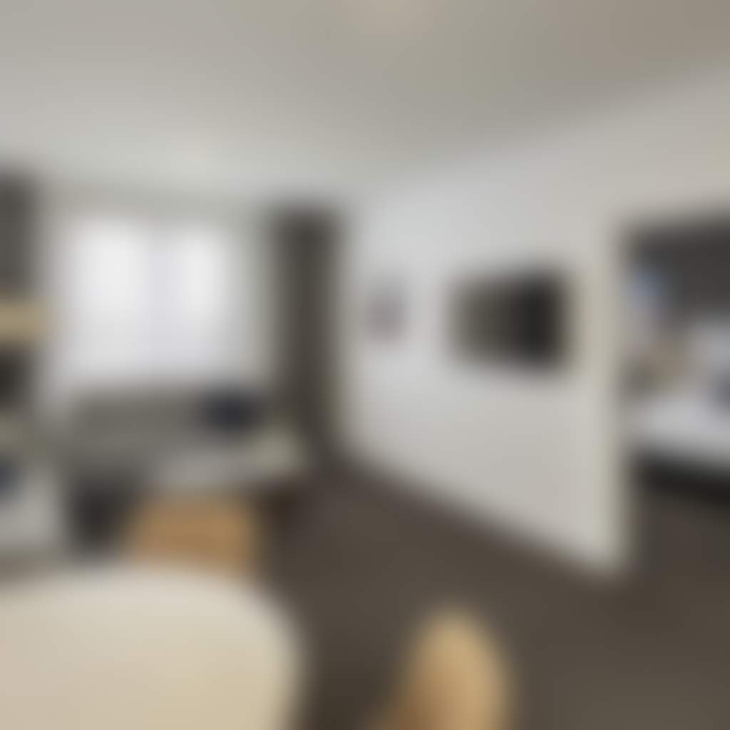 Mantra Traralgon guestroom with living area and bedroom