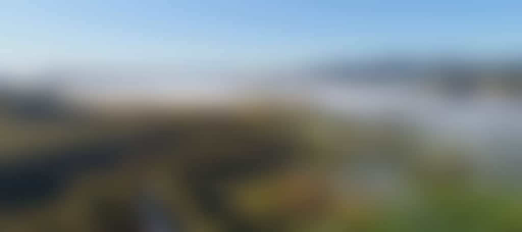 Buchan aerial view of town and mist in valley