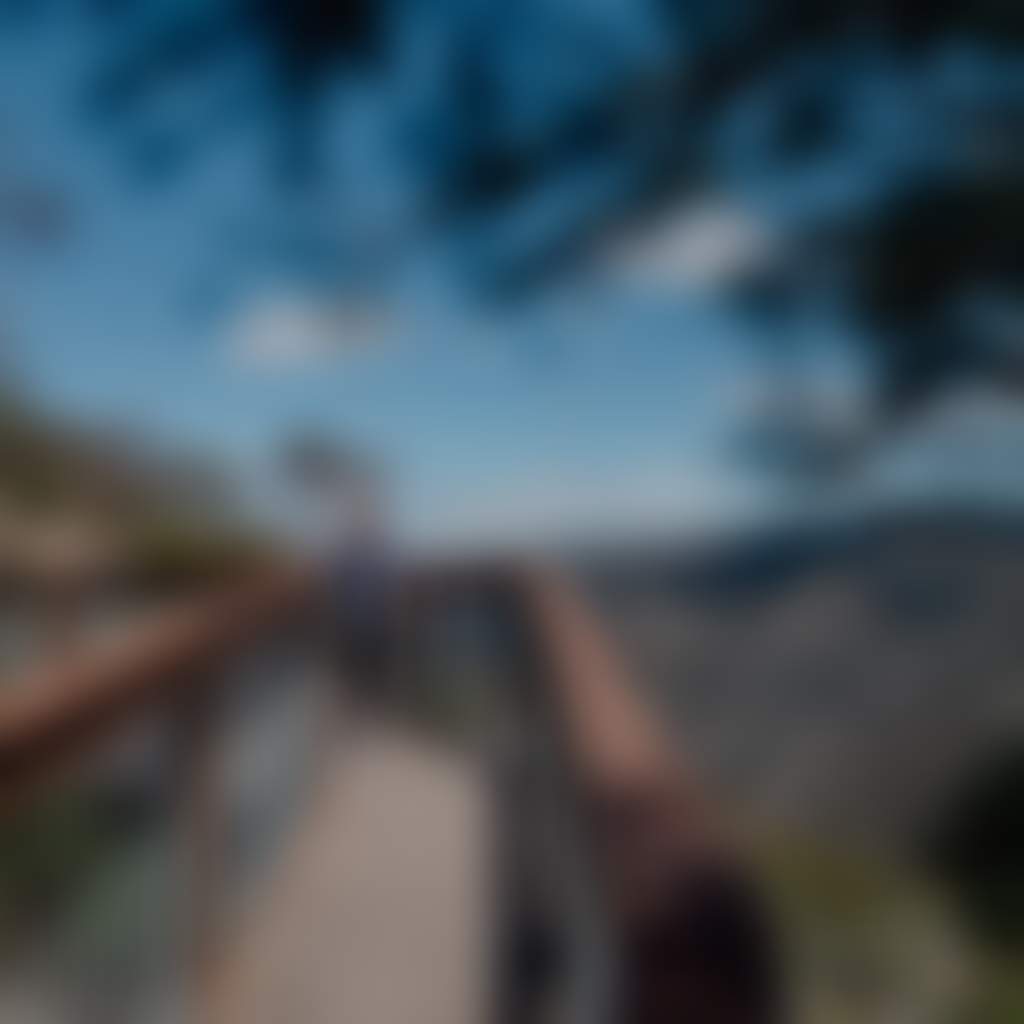 Woman walking on boardwalk overlooking Little River Gorge