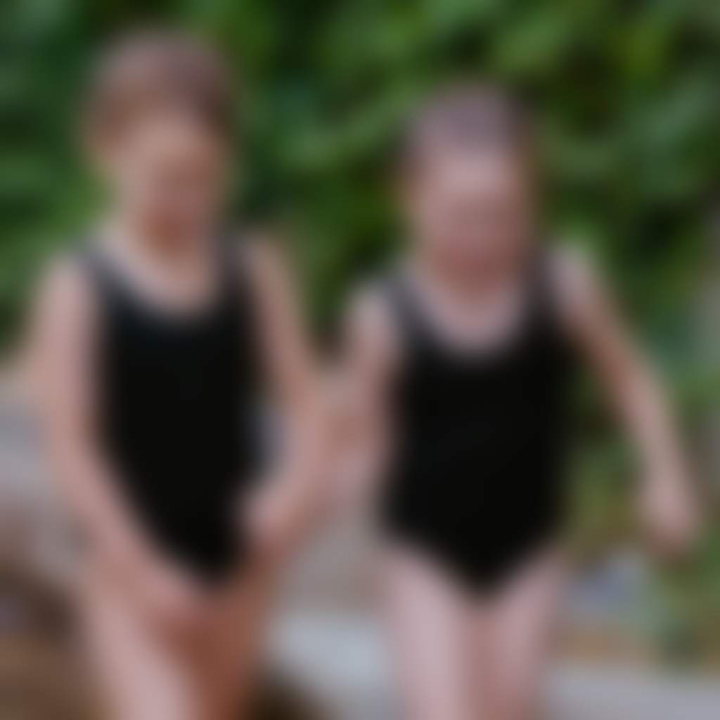 Metung Hot Springs children walking across reflexology walk landscape