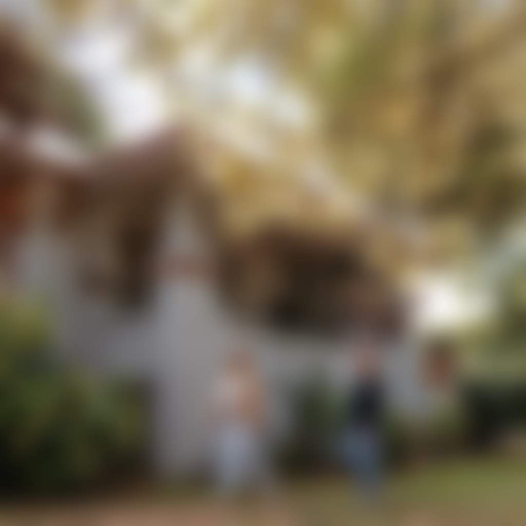 Warragul Art Studio WAS couple walking outside building under trees