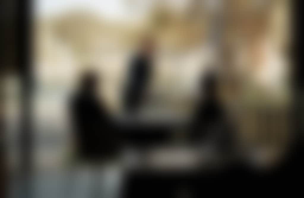 Sardine Dining Paynesville waiter serving people sitting at outdoor table