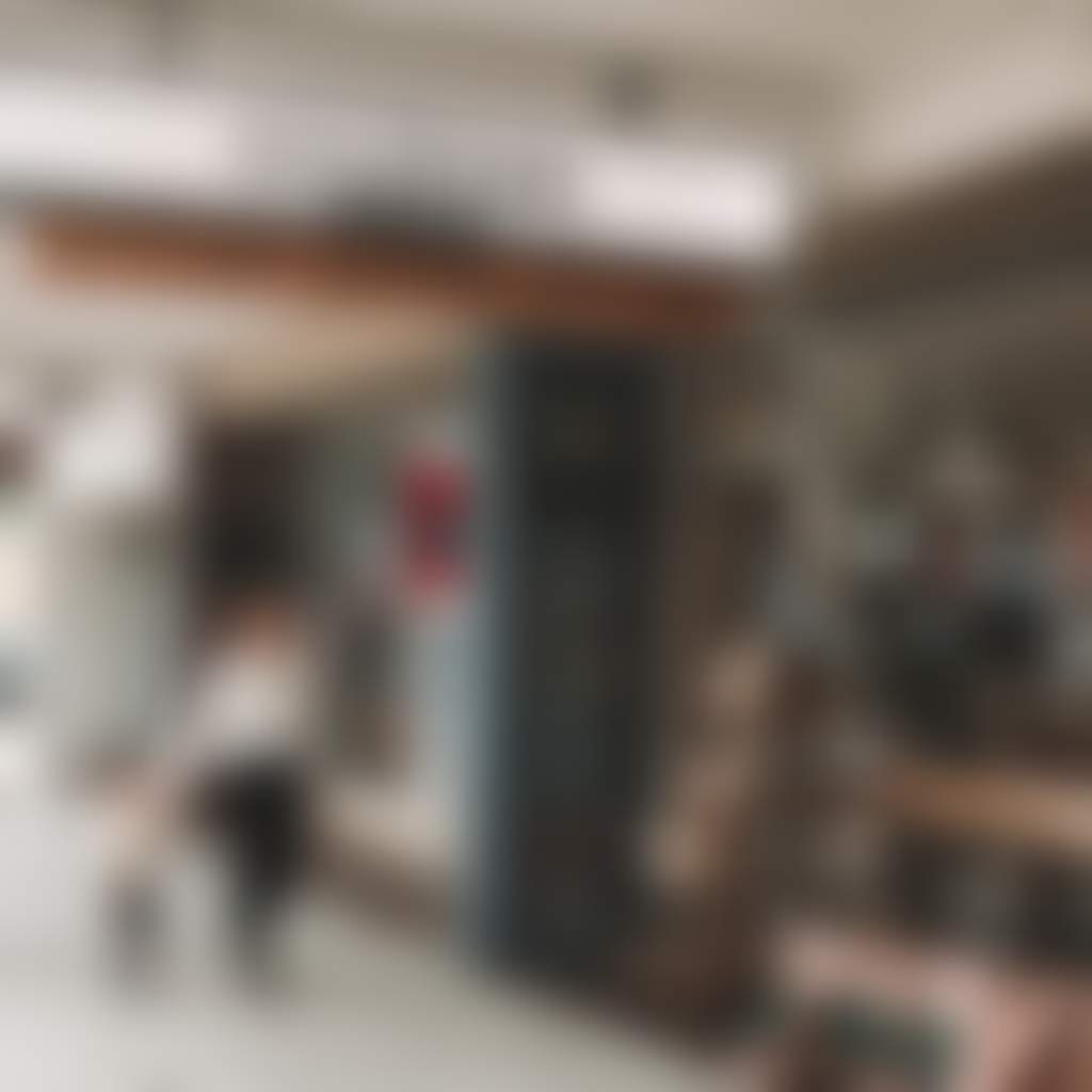 The Meeniyan Store family walking past produce store
