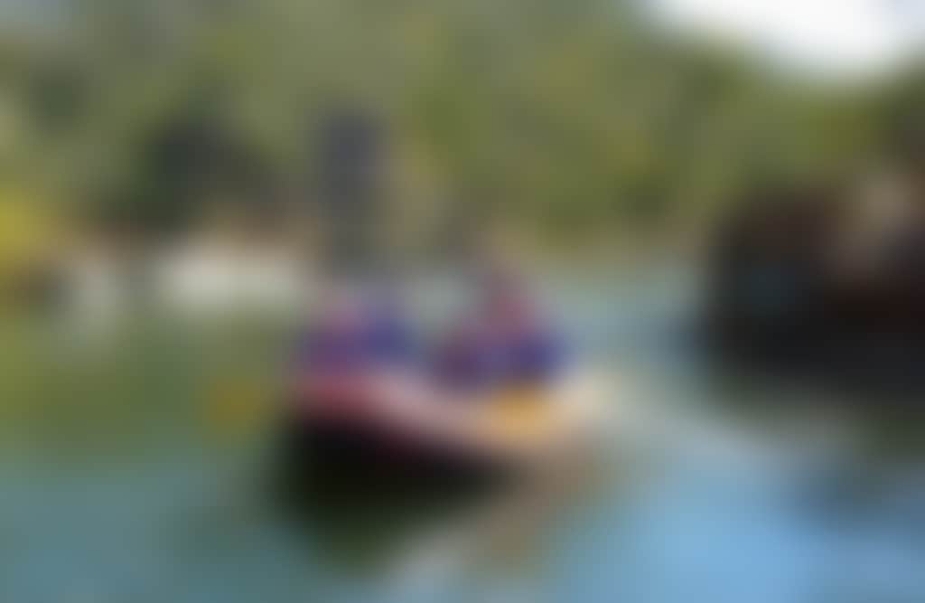 Group White Water Rafting on calm green waters on the Mitta Mitta River