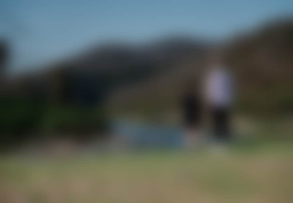 Mother and child overlooking the river at Balley Hooley aka the Junction near Buchan