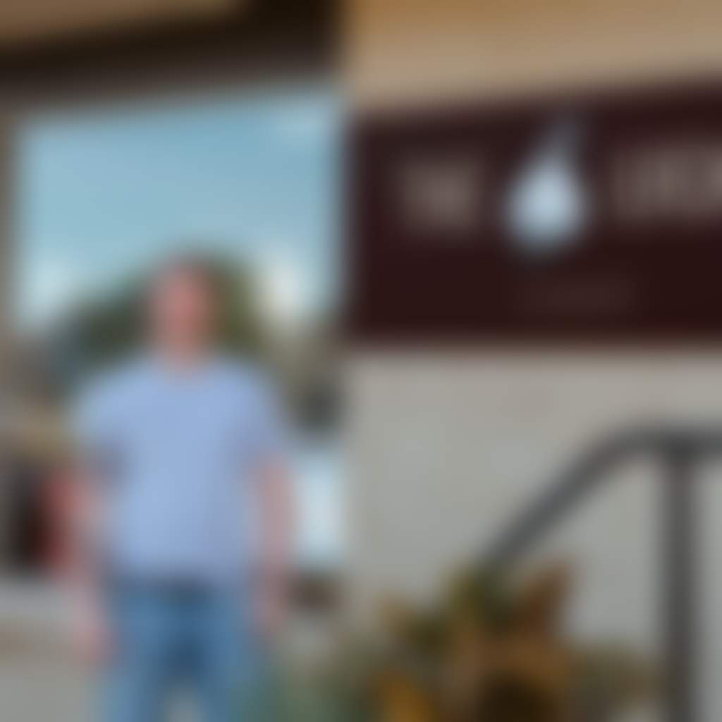 The Local Marlo owner in front of cafe