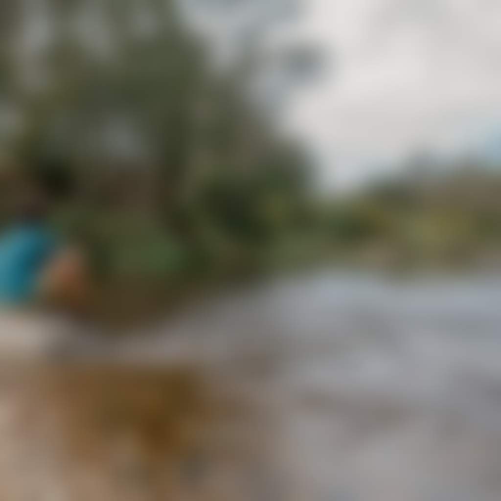 Ramrod creek Bruthen Tambo River person sits on rock enjoying view