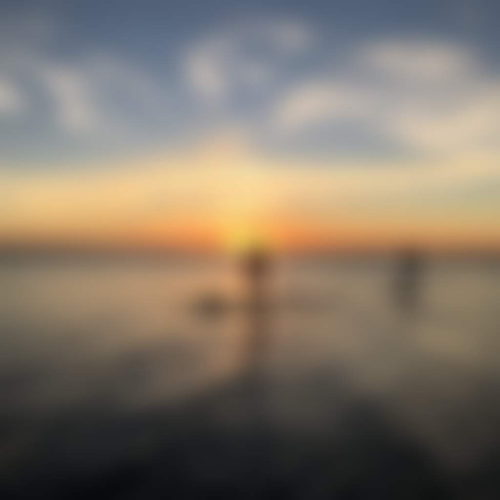 People on SU Ps with Venture Out at Sunset Gippsland Lakes