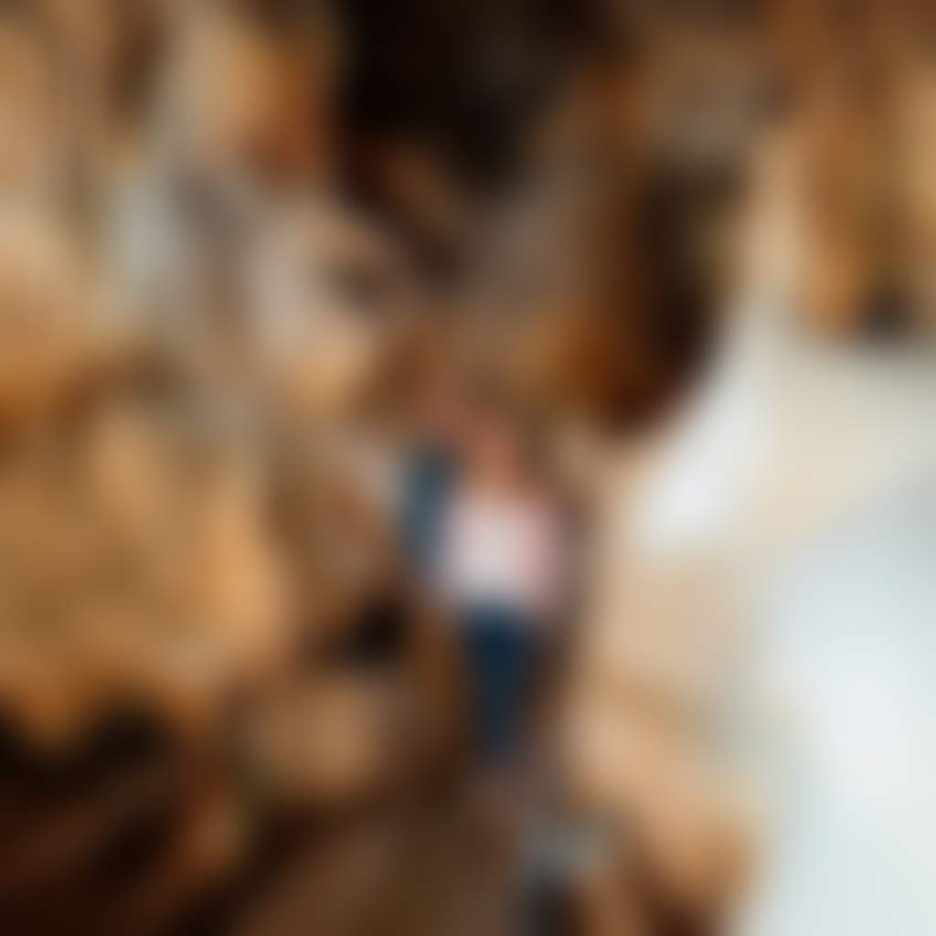 Couple walking through Buchan Caves