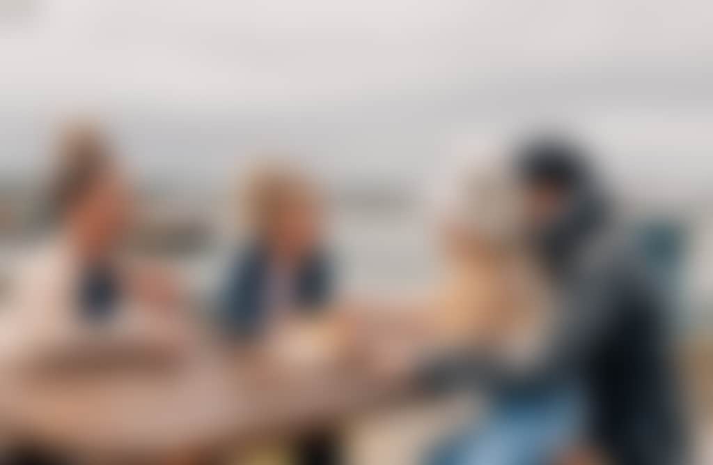 Port Albert family eating fish and chips on picnic table at waterfront Esplanade