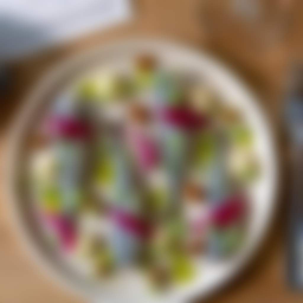 Sardine Dining Paynesville close up of brightly coloured meal on plate with cutlery