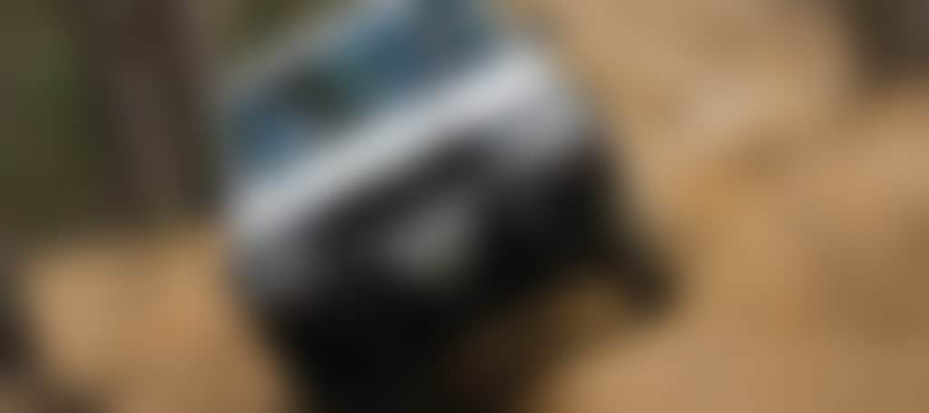 Four Wheel Drive 4 WD vehicle on a dirt road