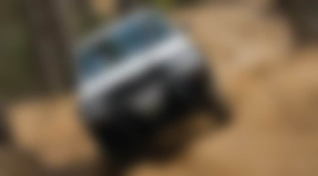 Four Wheel Drive 4 WD vehicle on a dirt road