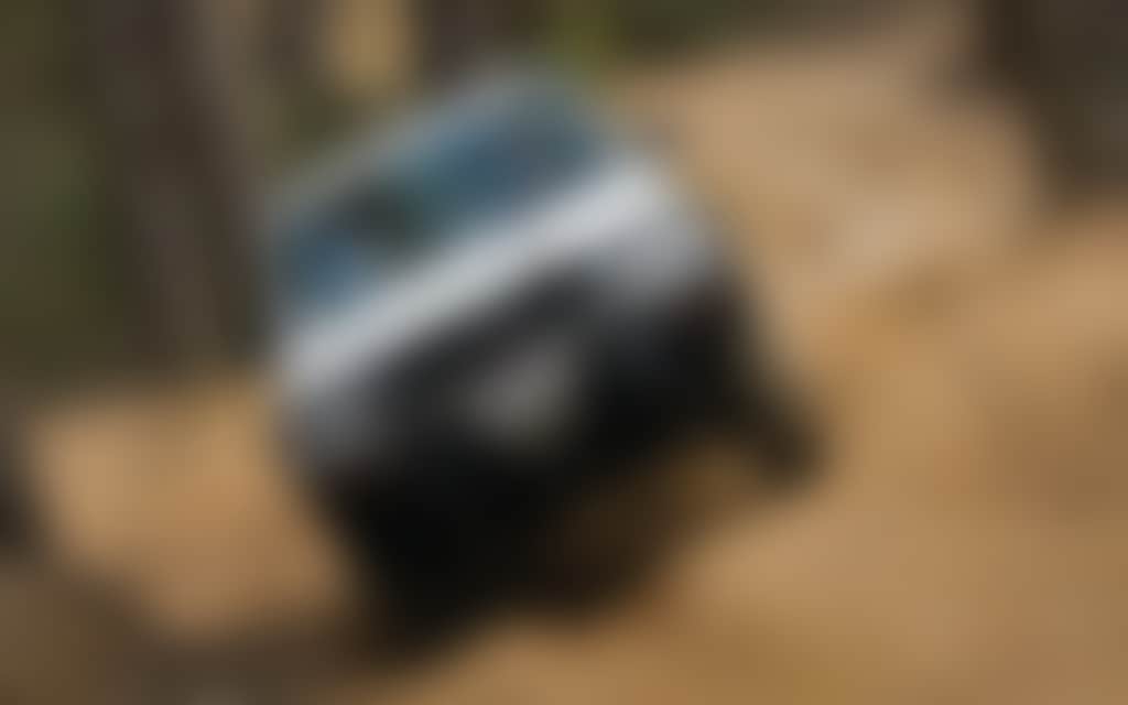Four Wheel Drive 4 WD vehicle on a dirt road