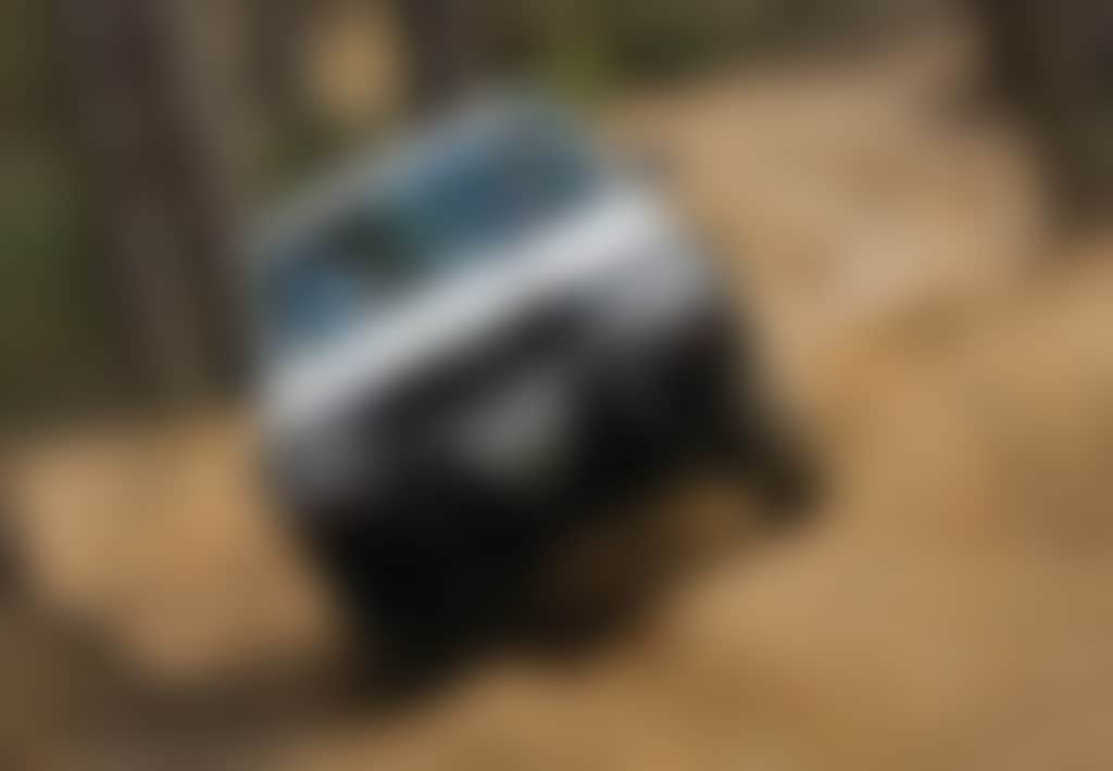 Four Wheel Drive 4 WD vehicle on a dirt road