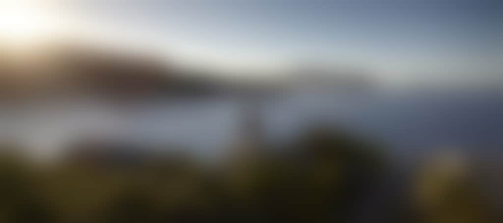 Couple Overlooking Water from Rocks at Pillar Point in Wilsons Prom