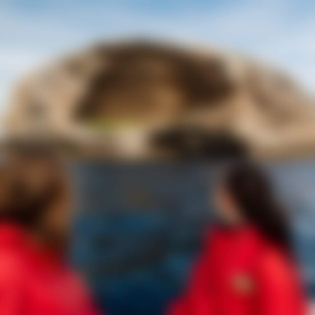 Wanderer Adventures people on boat in front of Skull Rock at Wilsons Prom