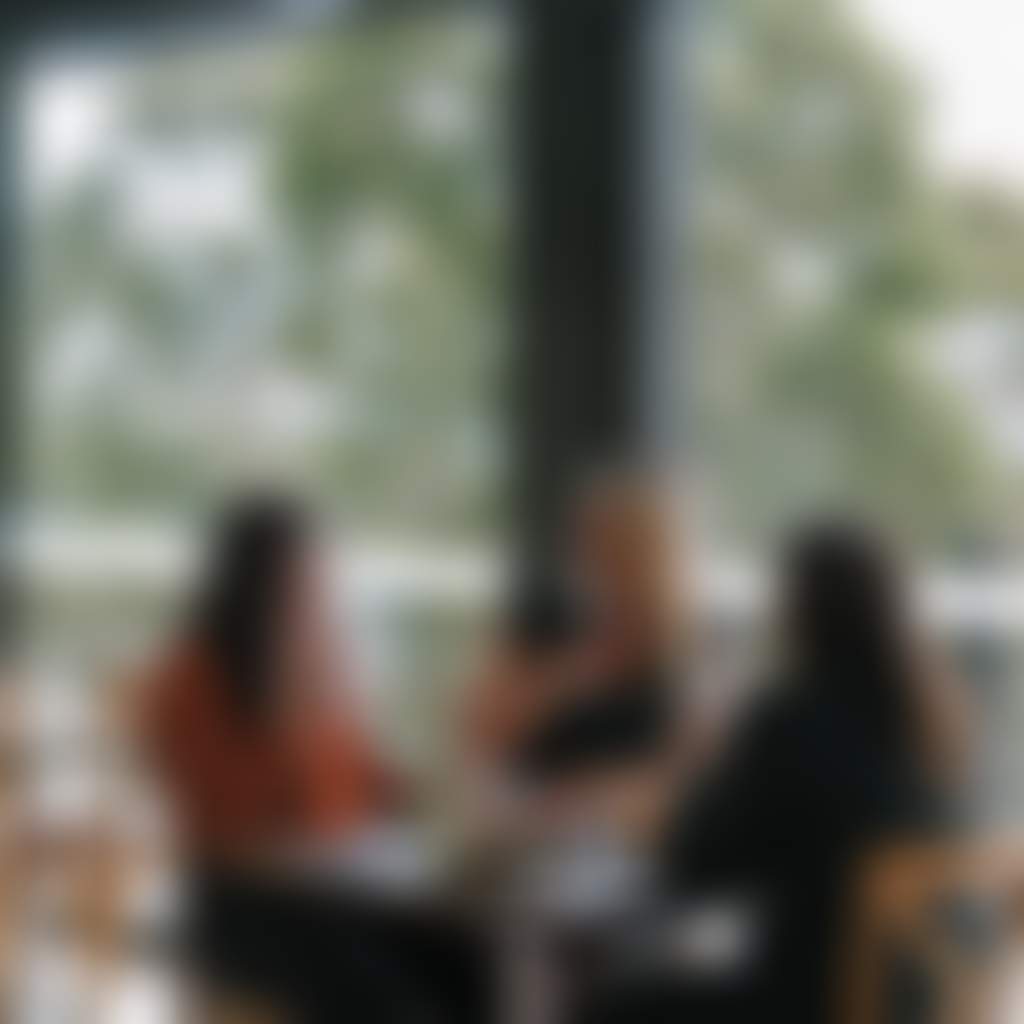 Brandy Creek Estate ladies having lunch at Drouin winery infront of glass windows