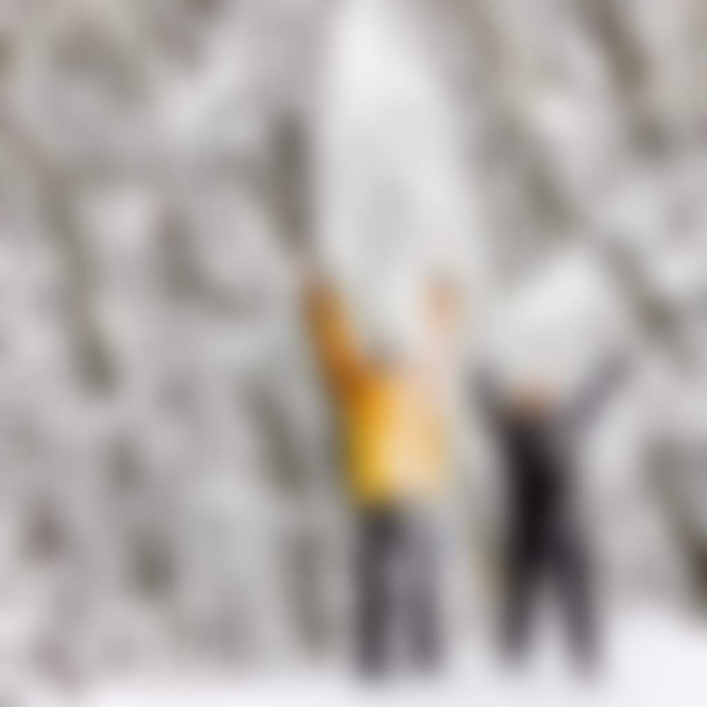 Mt Baw Baw Alpine Resort couple throwing snow in the air