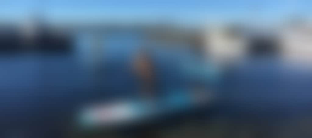 Kids on Venture Out paddleboards on the Gippsland Lakes