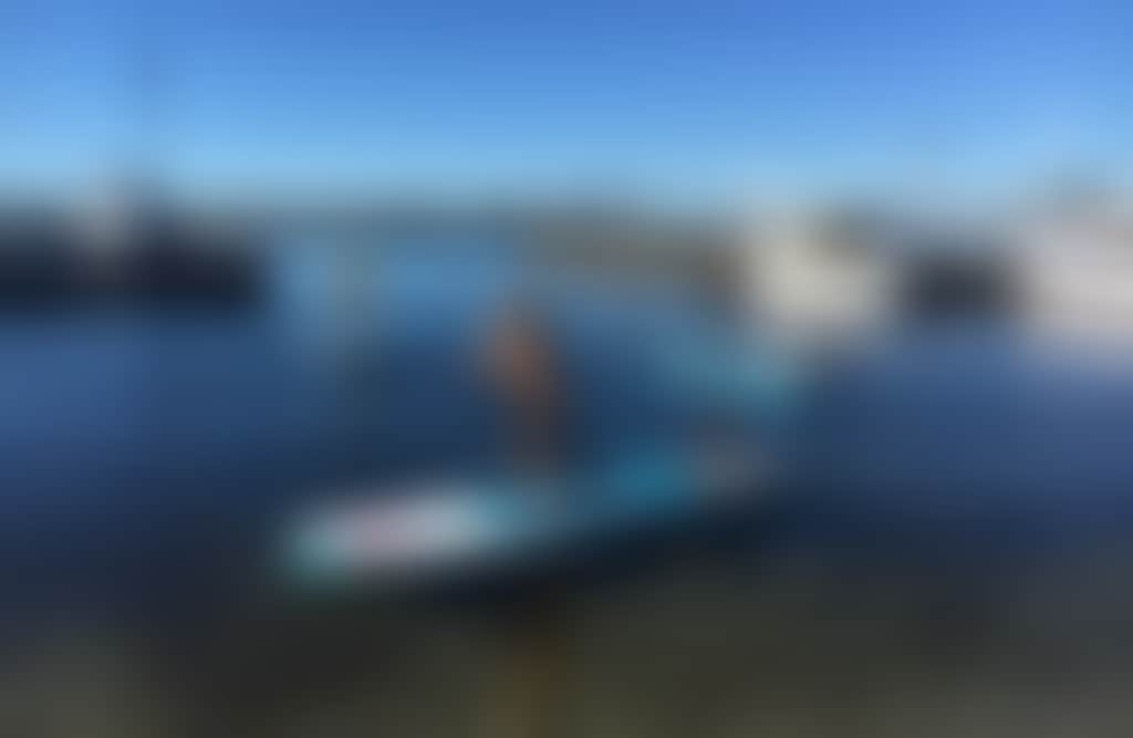 Kids on Venture Out paddleboards on the Gippsland Lakes