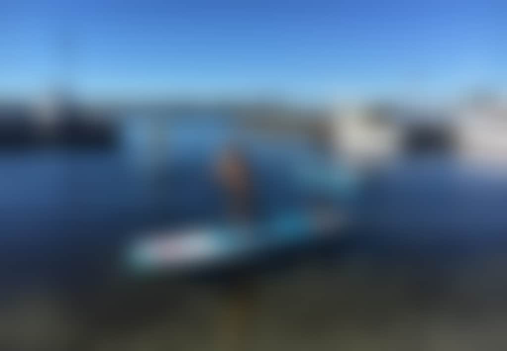 Kids on Venture Out paddleboards on the Gippsland Lakes
