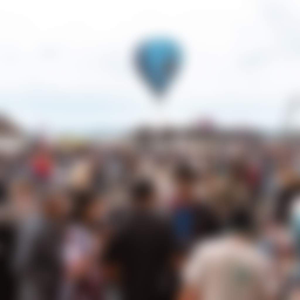 Anzac Weekend Airshow Sale crowd in front of hot air balloon
