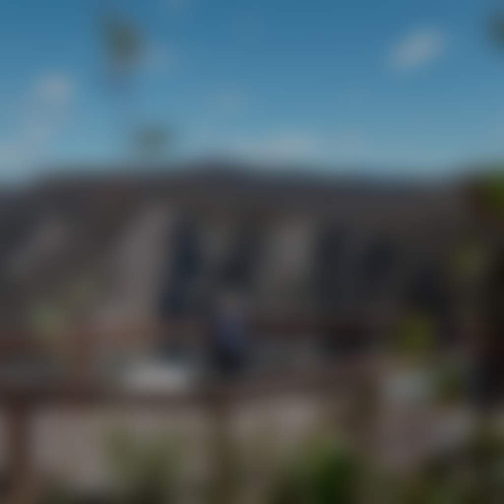 Woman on boardwalk overlooking Little River Gorge photographed through bush