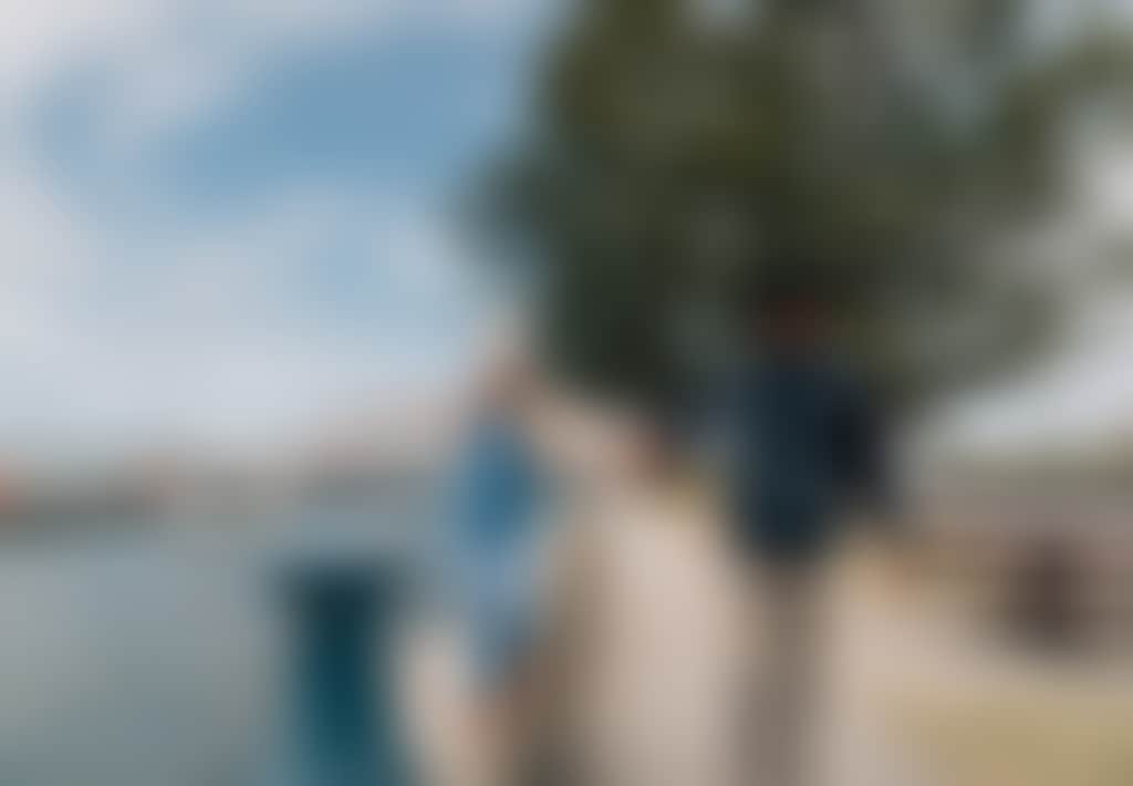 Port Albert father and daughter walking along esplanade at waterfront