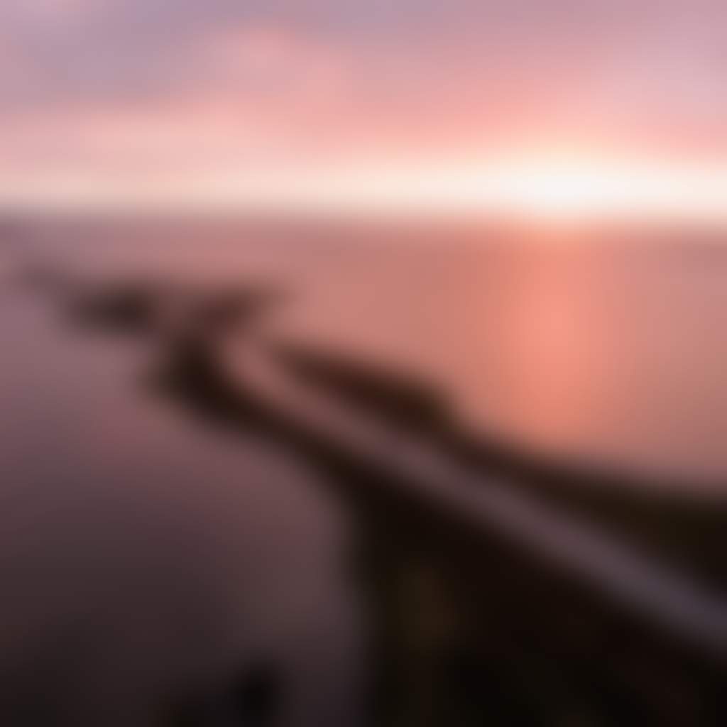 Mitchell River Silt Jetties Eagle Point view of jetties under pink sunrise