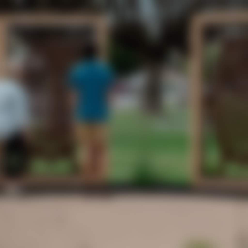 Bruthen couple in township looking at sculptures