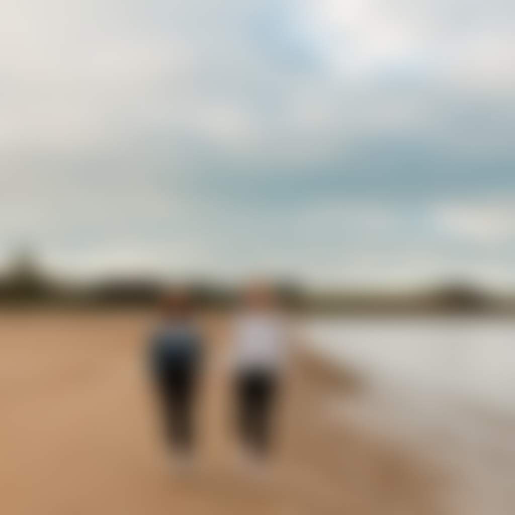Coronet Bay two people walking on the beach