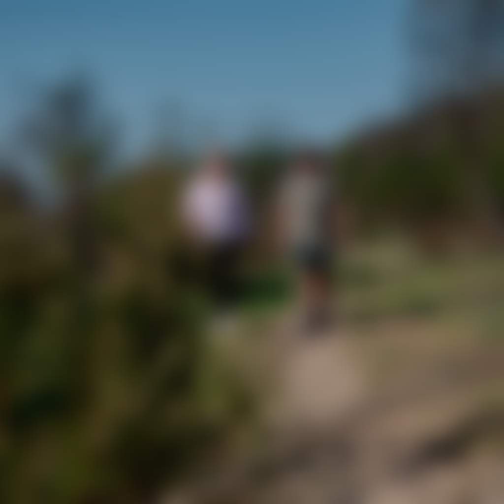 Couple walking at Balley Hooley aka the Junction near Buchan