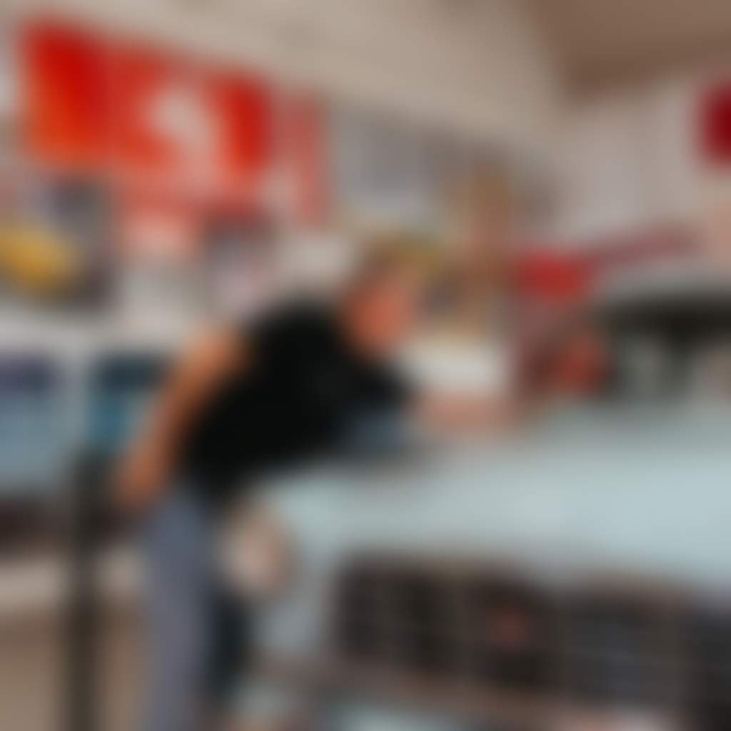 Trafalgar Holden Museum owner cleaning the car