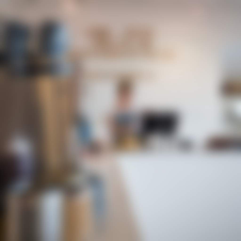 Woman behind counter at Albert Co cafe restaurant in Lakes Entrance
