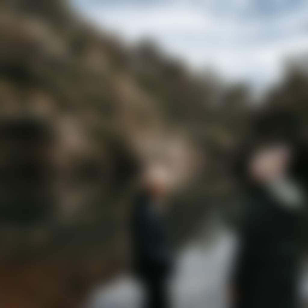 Blue Pool ladies standing at waters edge in beanies Freestone Gorge