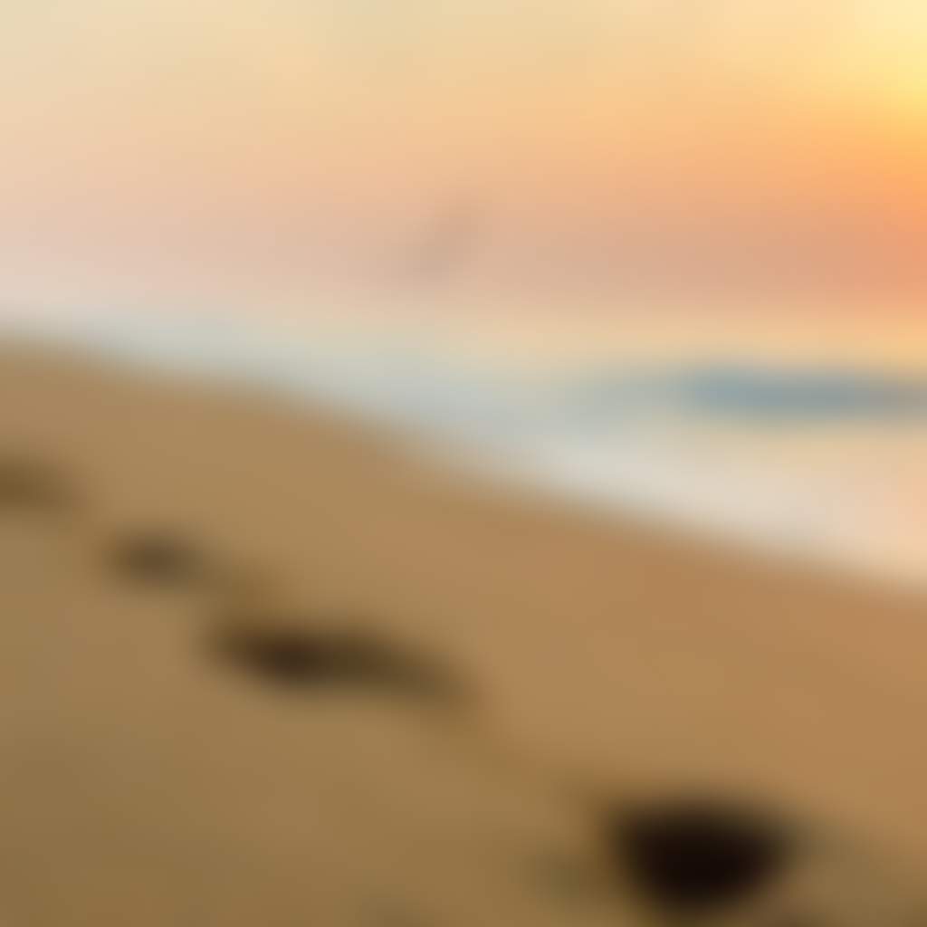 Ninety Mile Beach footsteps in the sand at sunset