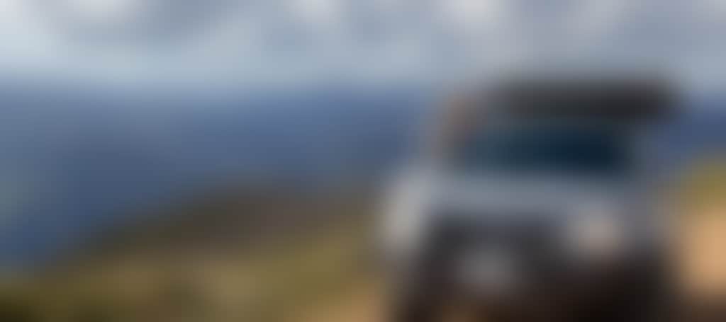 Girl looking at view from 4 WD at Seldom Seen Snowy River National Park near Wulgulmerang