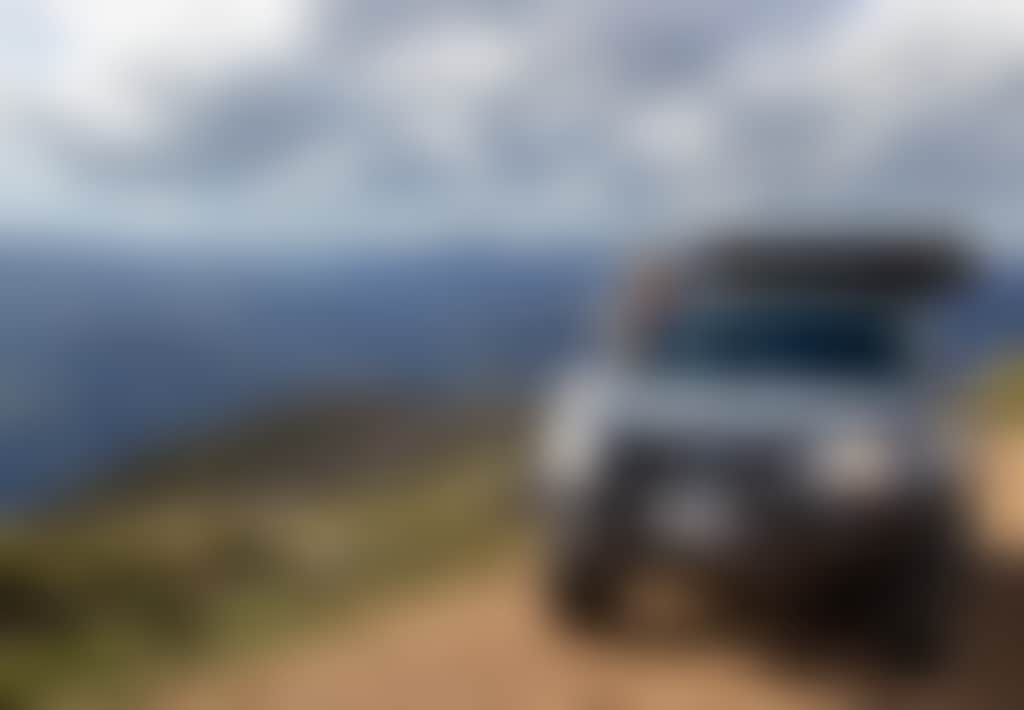 Girl looking at view from 4 WD at Seldom Seen Snowy River National Park near Wulgulmerang